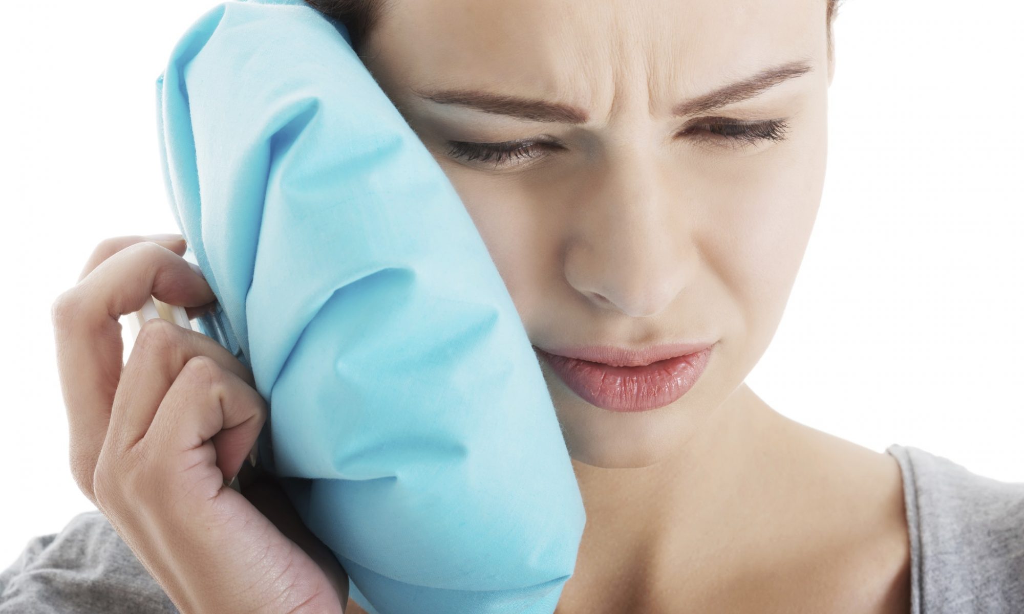 woman in pain with a toothache