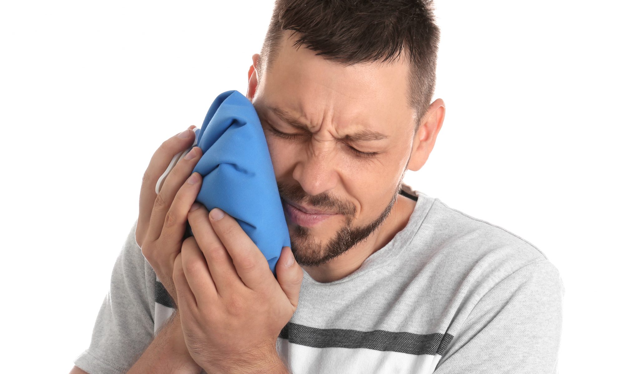 man in pain with a toothache